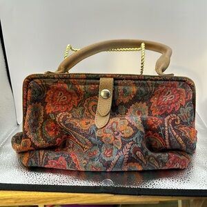 Richmark made in the USA tapestry vintage satchel.In used vintage condition.​​